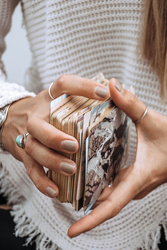 A spiritual reading with tarot cards, offering intuitive guidance and soul clarity through Align With Rosie